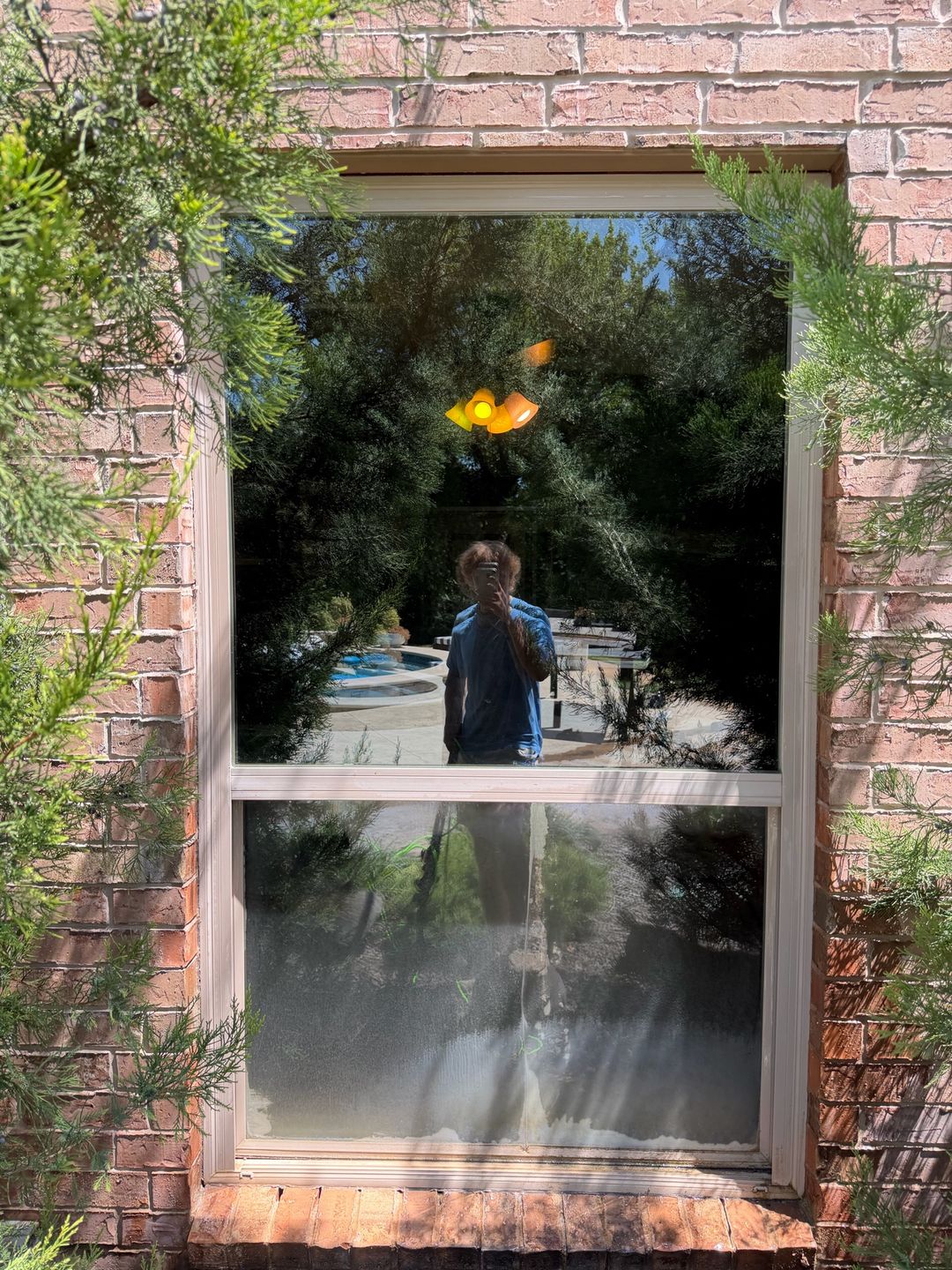 Window receiving a deep cleaning treatment for severe buildup