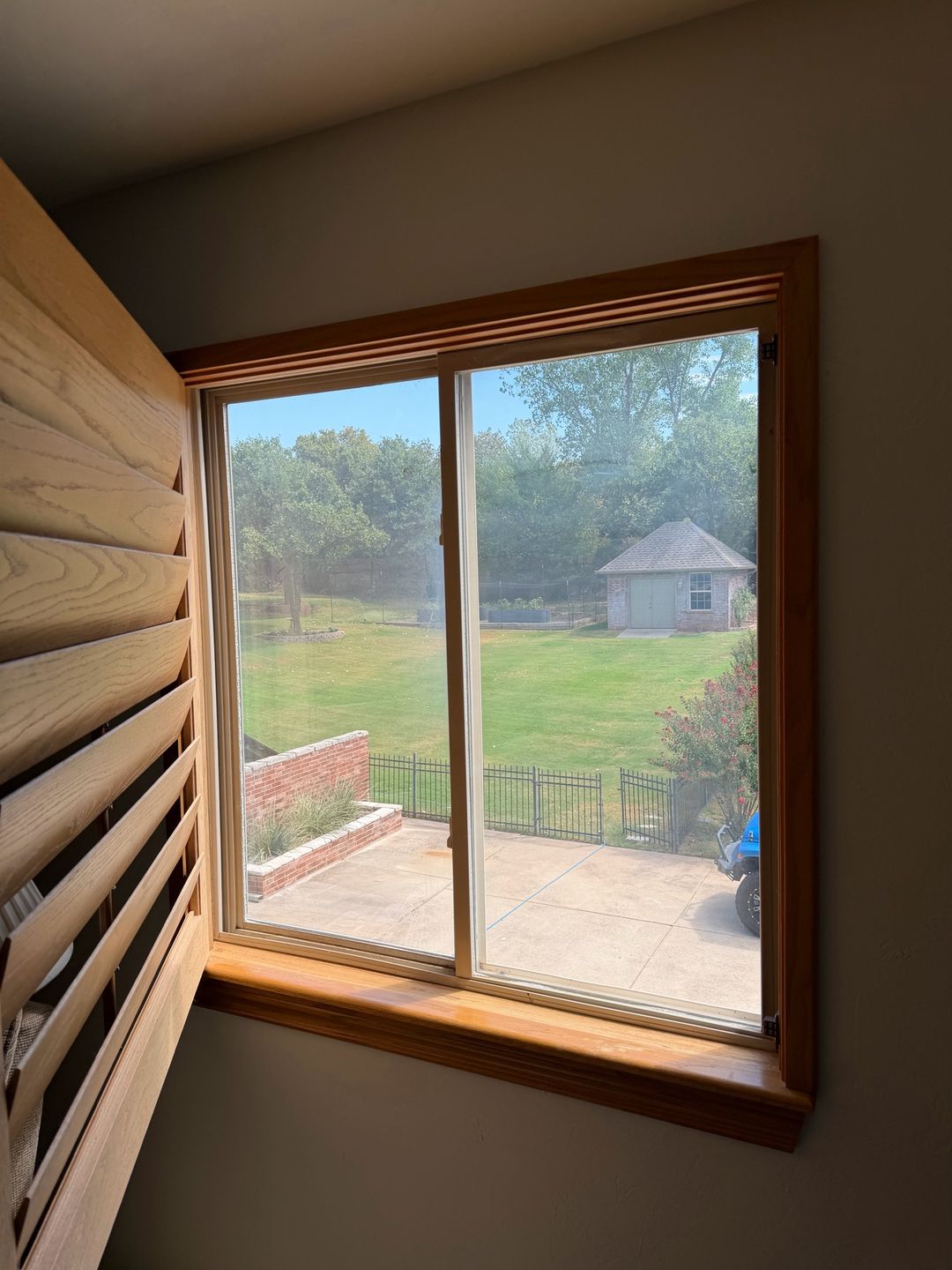 Interior window with a cloudy, hazy view before cleaning